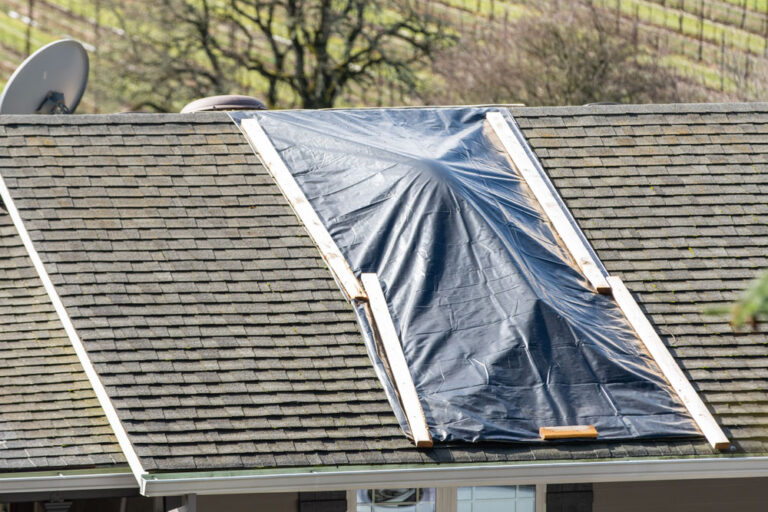 HOW TO REPAIR A DAMAGED ROOF WITH A TARP